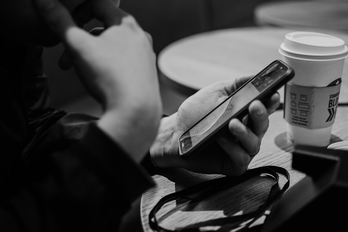 Person Holding Mobile Phone